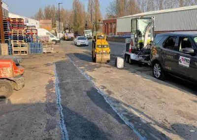 ProPatch Road Surfacing: Tarmac Application with Roller and Digger