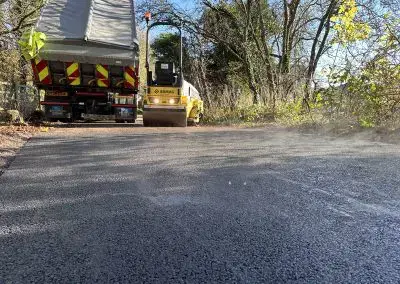 Fresh asphalt being compacted | Pro Patch Ltd